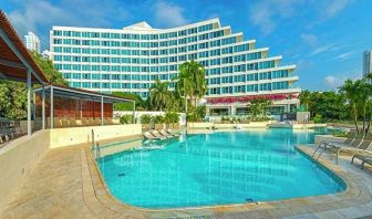 beautiful outdoor pool with sun beds at Hilton Cartagena Hotel.