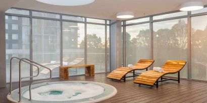 relaxing indoor jacuzzi with pool beds at Hilton Garden Inn Bogota Airport.