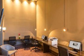 dedicated business center with PC, internet, work desks, and printer at Hilton Garden Inn Bogota Airport.