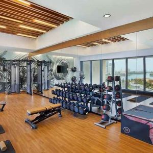 well equipped fitness center at DoubleTree by Hilton Sharjah Waterfront Hotel & Residences.