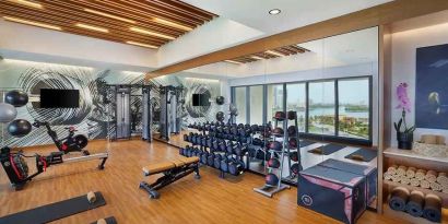 well equipped fitness center at DoubleTree by Hilton Sharjah Waterfront Hotel & Residences.