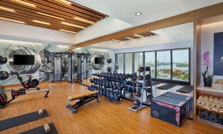 well equipped fitness center at DoubleTree by Hilton Sharjah Waterfront Hotel & Residences.