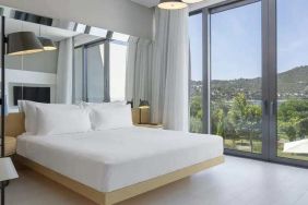 spacious king room with lots of natural light at Susona Bodrum, LXR Hotels & Resorts.