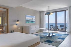 luxurious king suite with gorgeous water views at Susona Bodrum, LXR Hotels & Resorts.