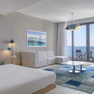 luxurious king suite with gorgeous water views at Susona Bodrum, LXR Hotels & Resorts.