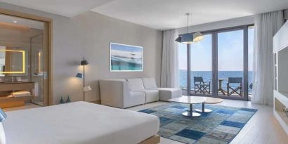 luxurious king suite with gorgeous water views at Susona Bodrum, LXR Hotels & Resorts.