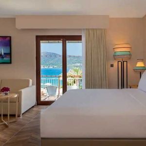 beautiful king suite with lounge and sea views at DoubleTree by Hilton Bodrum Isil Club Resort.