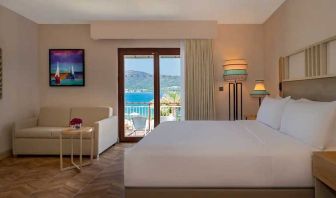 beautiful king suite with lounge and sea views at DoubleTree by Hilton Bodrum Isil Club Resort.