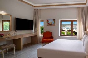 stunning king room with TV, work area, and beautiful sea views at DoubleTree by Hilton Bodrum Marina Vista.