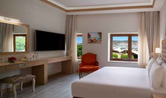 stunning king room with TV, work area, and beautiful sea views at DoubleTree by Hilton Bodrum Marina Vista.