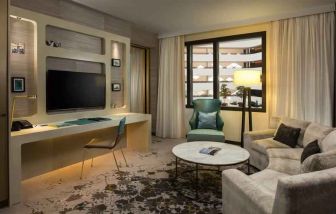 Comfortable living room suitable as workspace at the Hilton Amsterdam Airport Schiphol.