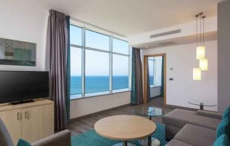 Living room perfect as workspace at the Hilton Garden Inn Tanger City Center.