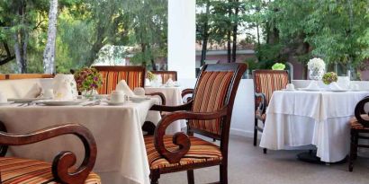 Outdoor patio perfect as workspace at the MM Grand Hotel Puebla, Tapestry Collection by Hilton.