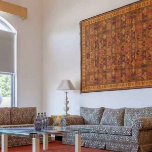 Stylish living room in a presidential suite at the MM Grand Hotel Puebla, Tapestry Collection by Hilton.