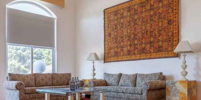 Stylish living room in a presidential suite at the MM Grand Hotel Puebla, Tapestry Collection by Hilton.