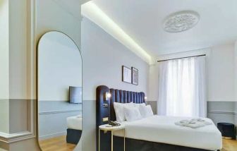 lovely king room with TV at Casa Alberola Alicante, Curio Collection by Hilton.