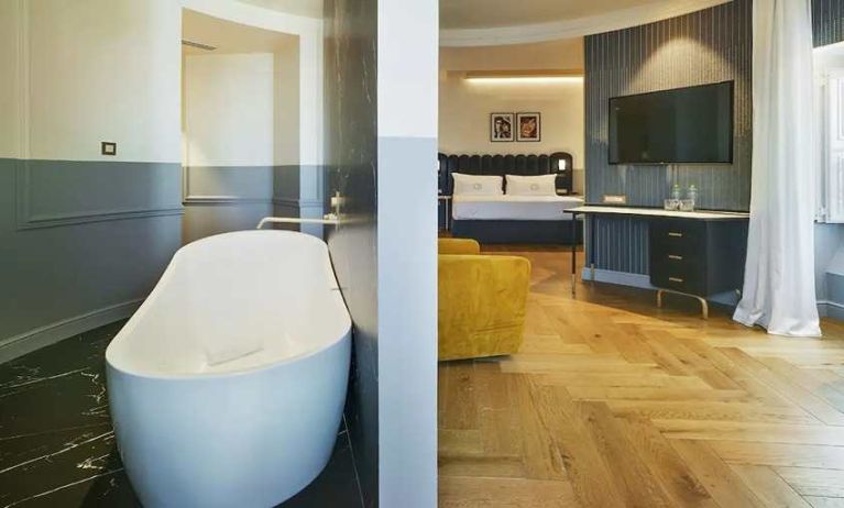 luxurious suite with relaxing bath tub at Casa Alberola Alicante, Curio Collection by Hilton.