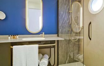 spacious and clean king bathroom at Casa Alberola Alicante, Curio Collection by Hilton.