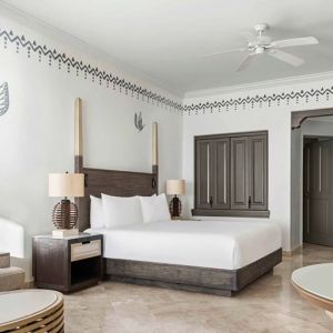 Spacious and comfortable king suite at the Hilton Los Cabos Beach & Golf Resort.