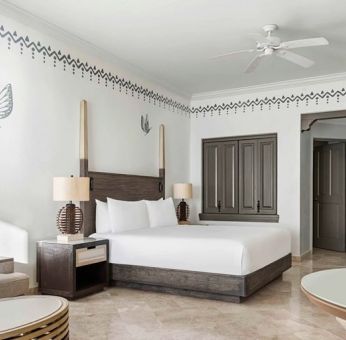 Spacious and comfortable king suite at the Hilton Los Cabos Beach & Golf Resort.