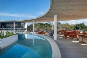 Relaxing outdoor pool at the Hilton Garden Inn Cancun Airport.