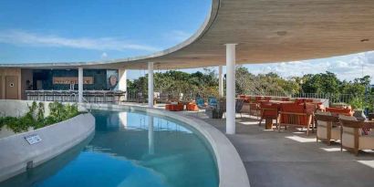 Relaxing outdoor pool at the Hilton Garden Inn Cancun Airport.