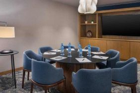 Meeting room with round table at the Hilton Garden Inn Cancun Airport.