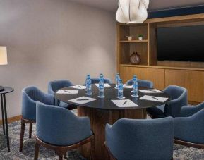 Meeting room with round table at the Hilton Garden Inn Cancun Airport.