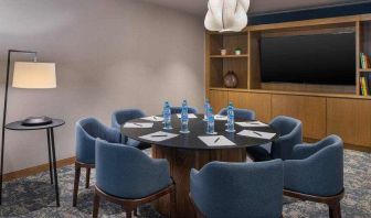 Meeting room with round table at the Hilton Garden Inn Cancun Airport.