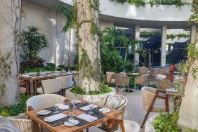 Outdoor patio perfect as workspace at the Hilton Garden Inn Cancun Airport.