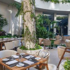 Outdoor patio perfect as workspace at the Hilton Garden Inn Cancun Airport.