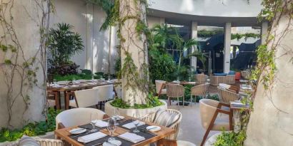 Outdoor patio perfect as workspace at the Hilton Garden Inn Cancun Airport.