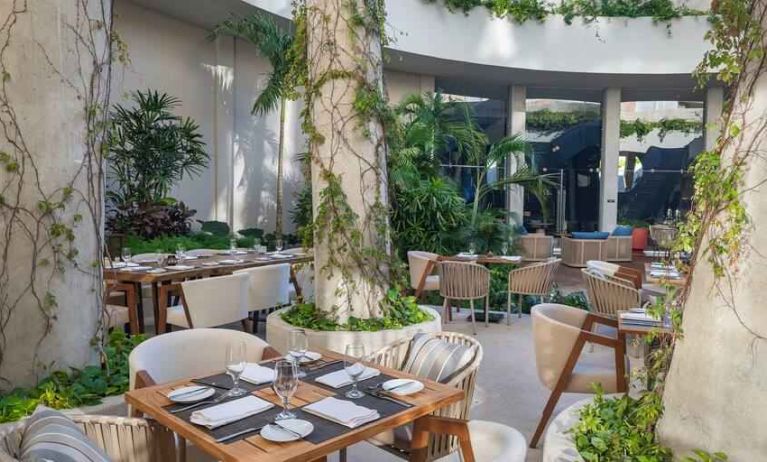 Outdoor patio perfect as workspace at the Hilton Garden Inn Cancun Airport.