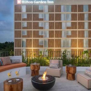 Terrace with firepit suitable for co-working at the Hilton Garden Inn Cancun Airport.