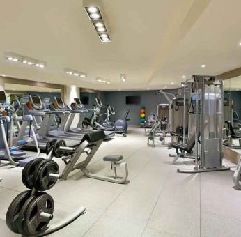 Fully equipped fitness center at the DoubleTree by Hilton Doha - Old Town.