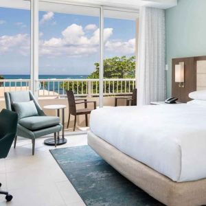 King bedroom with desk at the Caribe Hilton.