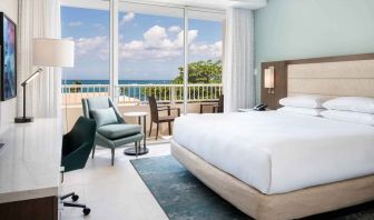 King bedroom with desk at the Caribe Hilton.