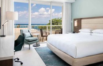 King bedroom with desk at the Caribe Hilton.