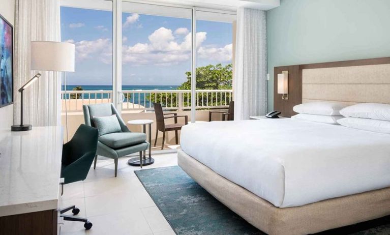 King bedroom with desk at the Caribe Hilton.