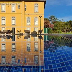 Outdoor patio suitable for co-working at the Boeira Garden Hotel Porto Gaia, Curio Collection by Hilton.