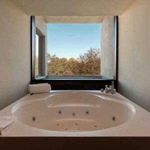 Bath tub at the Boeira Garden Hotel Porto Gaia, Curio Collection by Hilton.