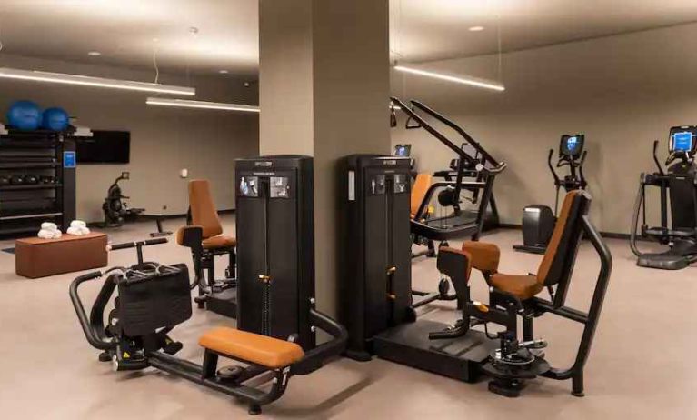 Fitness center with machines at the Hilton Porto Gaia.