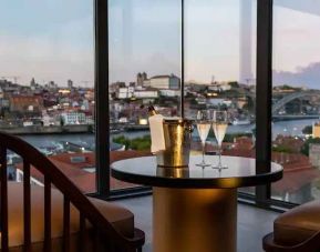 Seating area overlooking the city at the Hilton Porto Gaia.