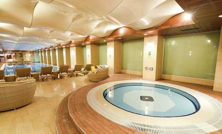 luxurious indoor pool and jacuzzi at DoubleTree by Hilton Istanbul Topkapi.