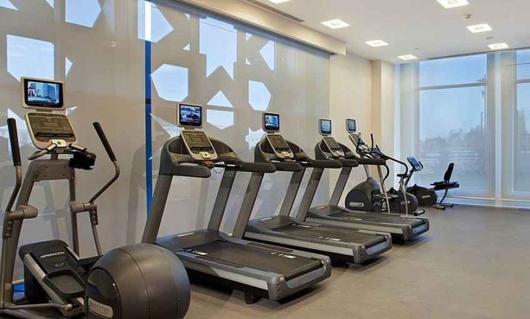 well equipped fitness center with treadmills, step machines, and weights at Hilton Garden Inn Konya, Turkey.