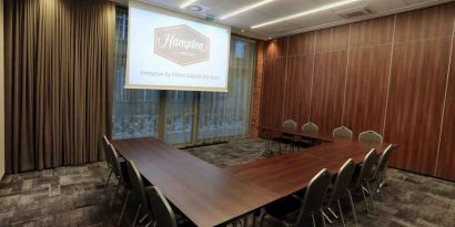 Meeting room with u shape table at the Hampton by Hilton Gdansk Old Town.