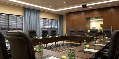 Meeting room with square table at the Hilton Warsaw City.