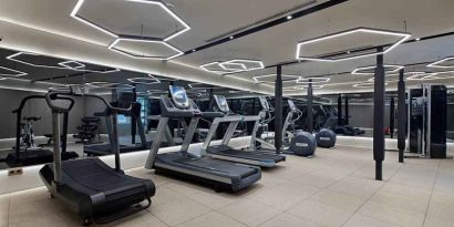 well equipped fitness center with treadmills at Hagia Sofia Mansions Istanbul, Curio Collection by Hilton.