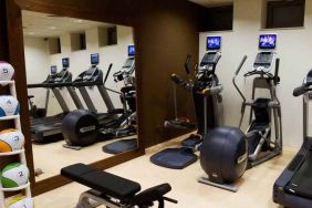 Fitness center with machines at the Hilton Garden Inn Krakow.