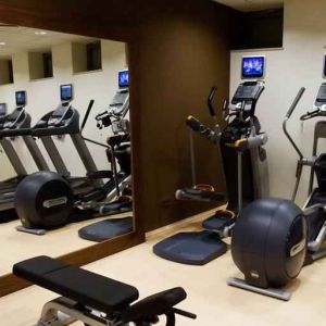 Fitness center with machines at the Hilton Garden Inn Krakow.